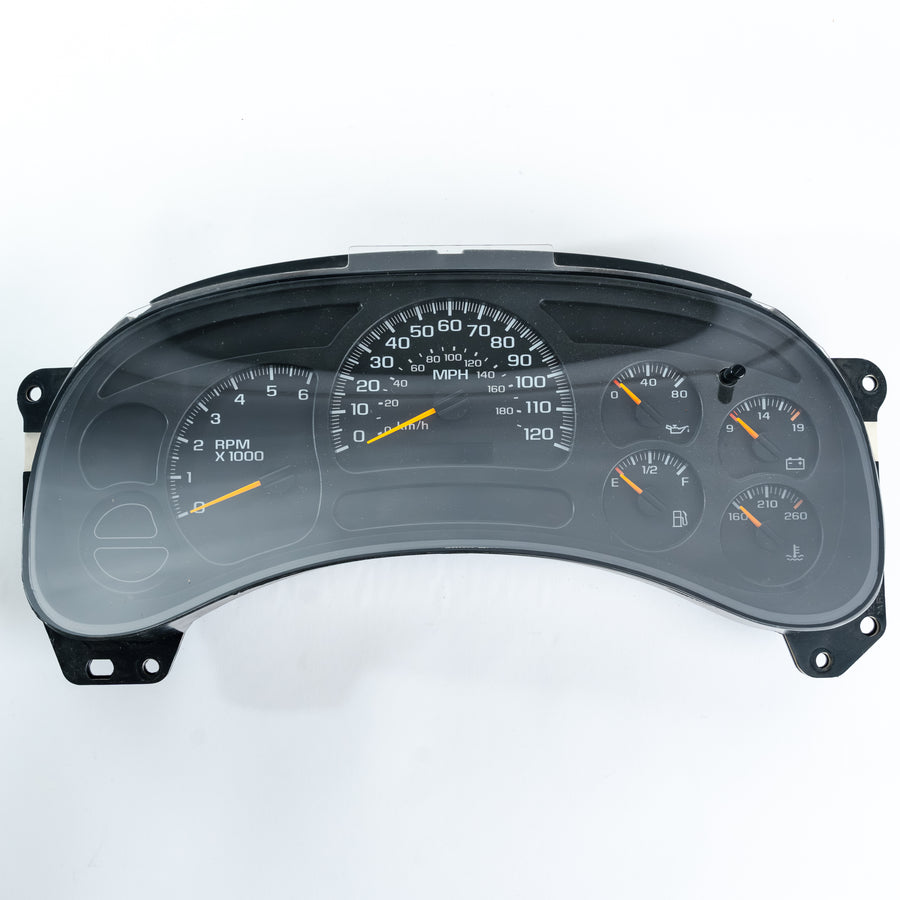 2003–2006 Chevy Silverado and GMC Sierra instrument cluster showing speedometer, tachometer, fuel gauge, temp gauge, and oil pressure gauge panel. Common GM gauge cluster repair for stepper motors, backlighting, and dead gauge issues.

