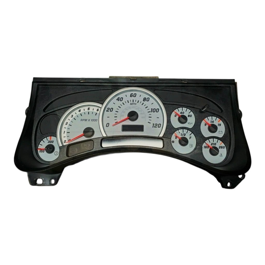 2003–2006 Hummer H2 instrument cluster with white gauge faces showing speedometer, tachometer, and auxiliary gauges.
