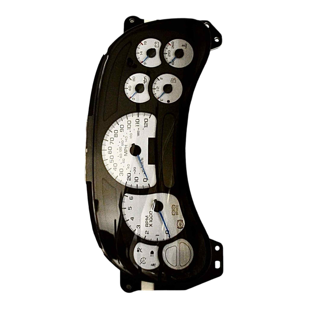 Close-up of 2003 GMC Yukon instrument cluster with white face gauges and black casing, ready for professional repair and rebuild service