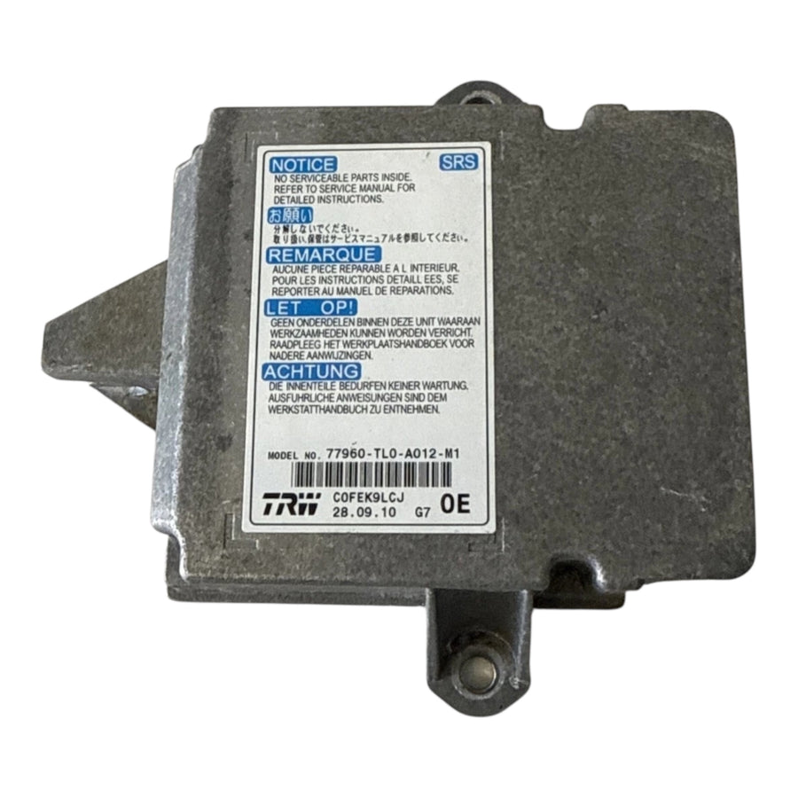Acura SRS airbag control module model 77960-TL0-A012-M1 shown on white background — reset service for crash data, airbag light, and locked SRS unit.